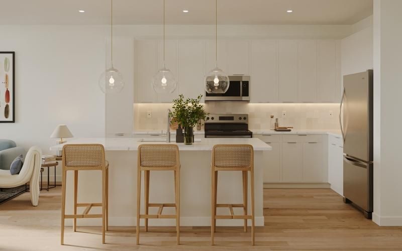 a kitchen with white cabinets